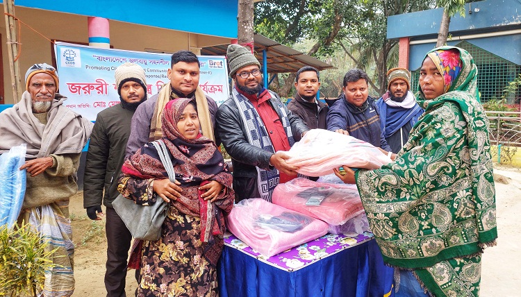 Cold-hit people get blankets in Naogaon